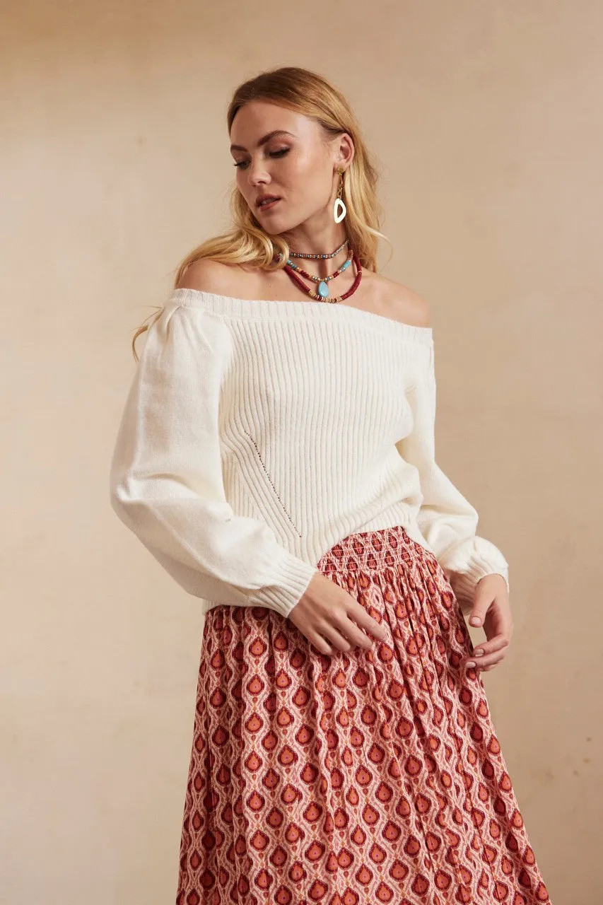 Off-shoulder sweater in cream by NKN