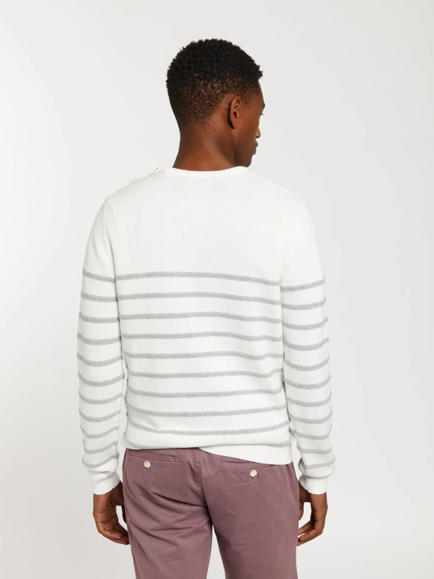 Striped sweater with shoulder placket